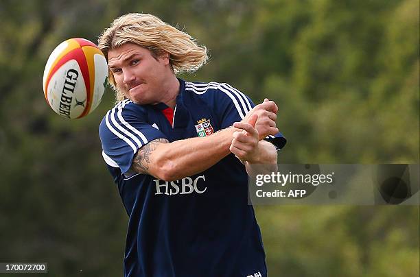 British and Irish Lions team member Richard Hibbard takes part in a rugby training session at the Anglican Church Grammar School in Brisbane on June...