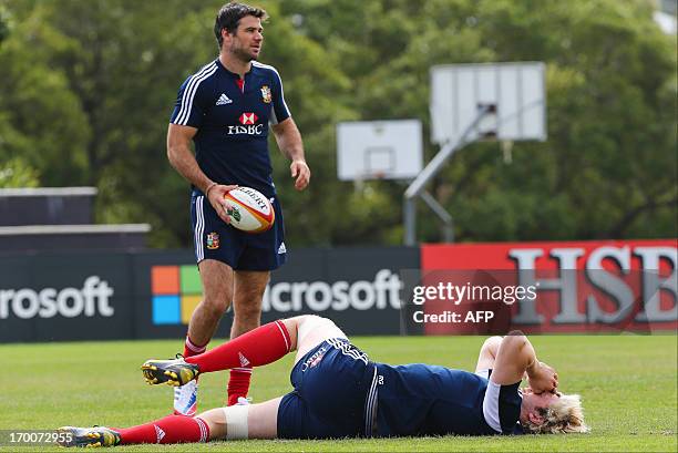 British and Irish Lions players Mike Phillips and Richard Hibbard prepare for a rugby training session at the Anglican Church Grammar School in...