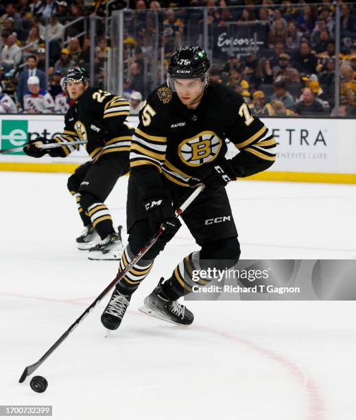 Alec Regula of the Boston Bruins skates during the second period of a preseason game against the New York Rangers at the TD Garden on September 24,...