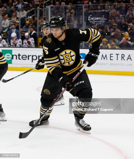 Alec Regula of the Boston Bruins skates during the second period of a preseason game against the New York Rangers at the TD Garden on September 24,...