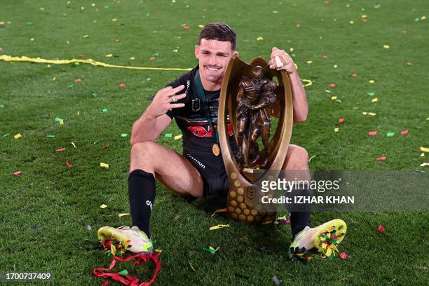 Nathan Cleary of the Panthers celebrates with the trophy after winning the 2023 NRL Grand Final match between Penrith Panthers and Brisbane Broncos...