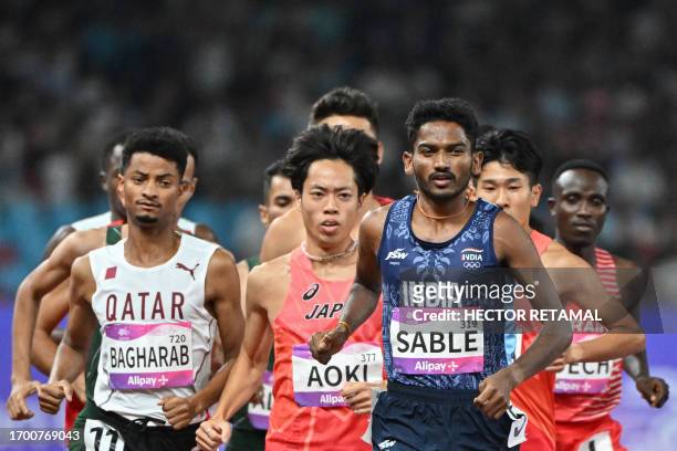 India's Avinash Sable competes in the men's 3,000m steeplechase final athletics event during the 2022 Asian Games in Hangzhou in China's eastern...