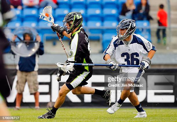 David Earl of the New York Lizards in action against Jesse Bernhardt of the Chesapeake Bayhawks during their Major League Lacrosse game at Icahn...