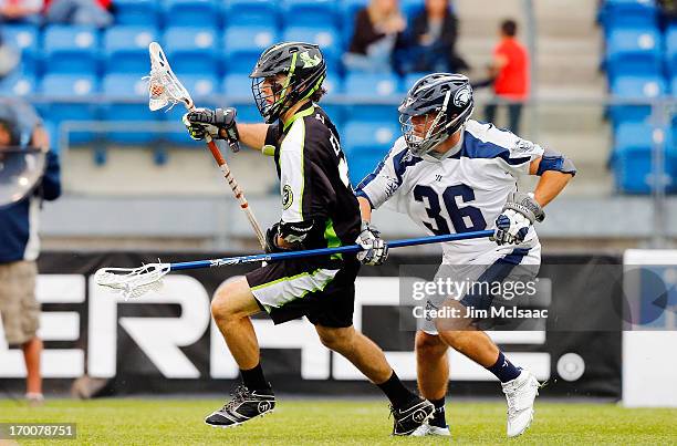 David Earl of the New York Lizards in action against Jesse Bernhardt of the Chesapeake Bayhawks during their Major League Lacrosse game at Icahn...