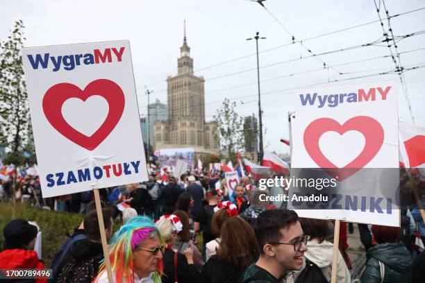 People gather ahead of the opposition's "Million Hearts March" in Warsaw, Poland on October 01, 2023. A demonstration initiated by the biggest Polish...