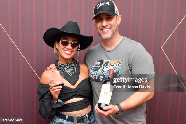 Madeline Edwards and BV Winemaker Trevor Durling seen at Day 2 of Pilgrimage Music & Cultural Festival 2023, sponsored by Beaulieu Vineyard, on...