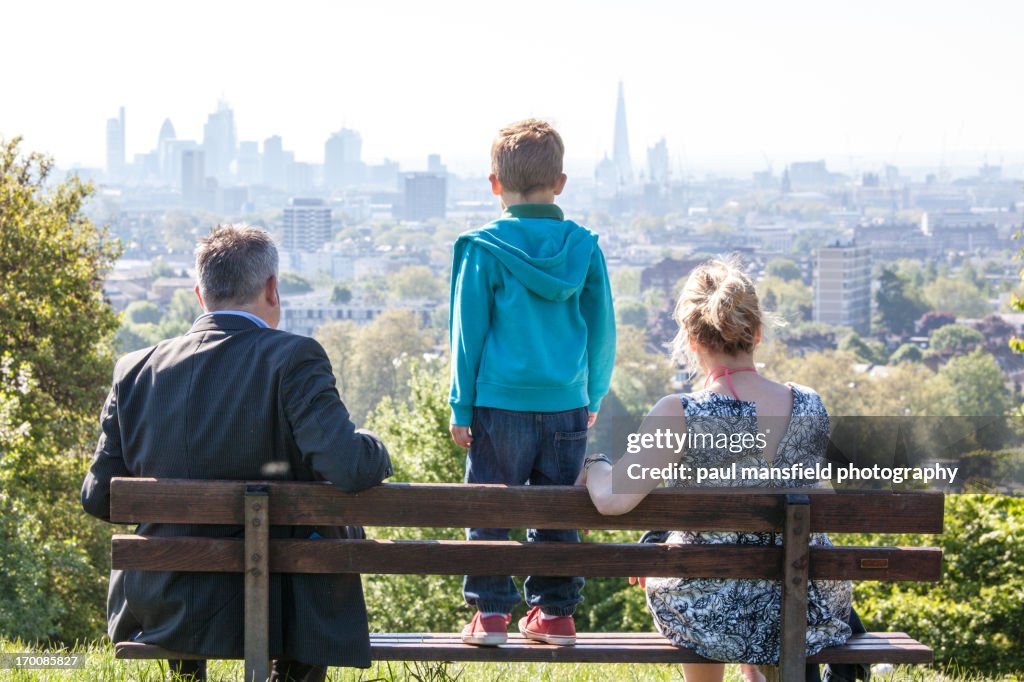 Family viewing London skyline