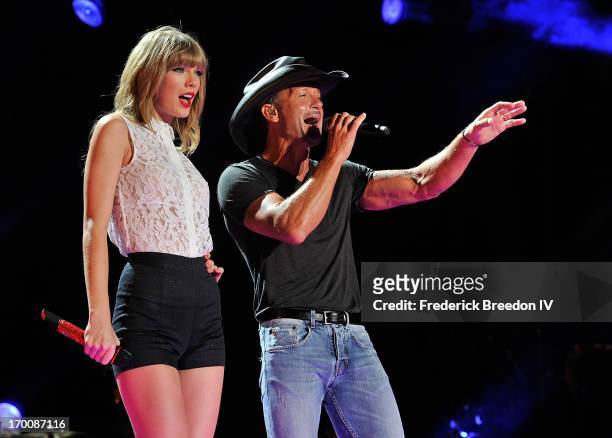Taylor Swift and Tim McGraw perform at LP Field during the 2013 CMA Music Festival on June 6, 2013 in Nashville, Tennessee.