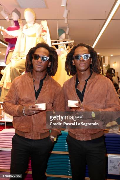 Brice Abby and Regis Abby attend the Uniqlo Opera Reopening as part of Paris Fashion Week on September 25, 2023 in Paris, France.