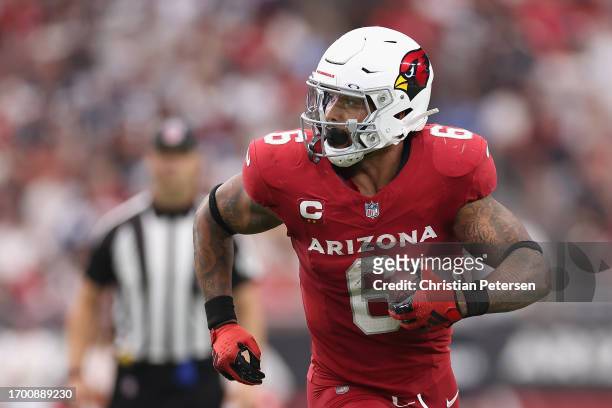 Running back James Conner of the Arizona Cardinals rushes the football against the Dallas Cowboys during the NFL game at State Farm Stadium on...