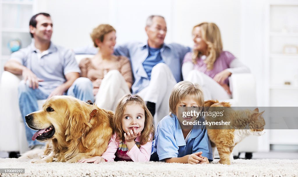 Cheerful family with pets