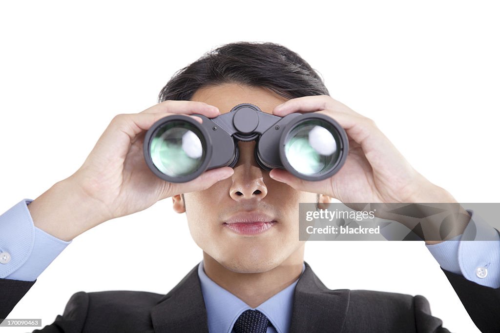 Businessman Looking Through Binoculars