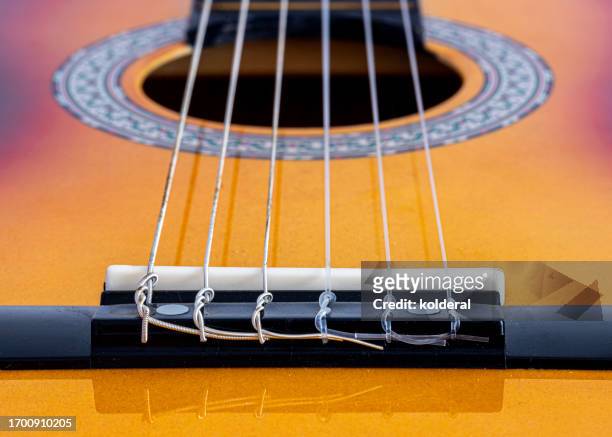 acoustic guitar closeup - musical instrument string stock pictures, royalty-free photos & images