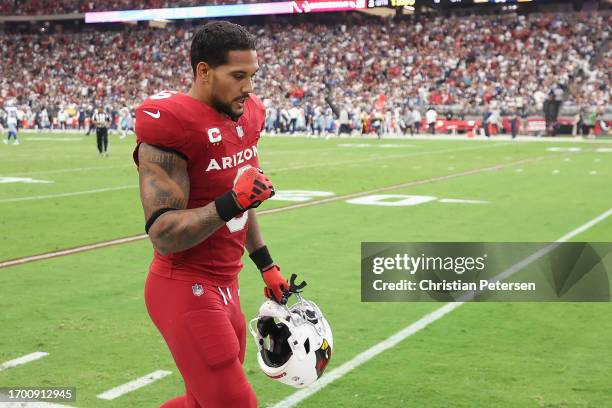 Running back James Conner of the Arizona Cardinals reacts as he walks off the field during the NFL game at State Farm Stadium on September 24, 2023...