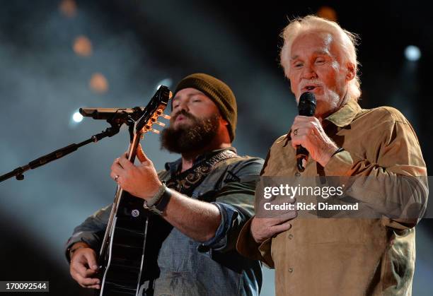 Zac Brown is joined on stage by Kenny Rogers to perform "The Gambler" during the 2013 CMA Music Festival on June 6, 2013 in Nashville, Tennessee.