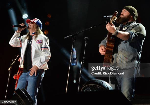Kid Rock joins Zac Brown on stage to perform "Were an American Band" during the 2013 CMA Music Festival on June 6, 2013 in Nashville, Tennessee.