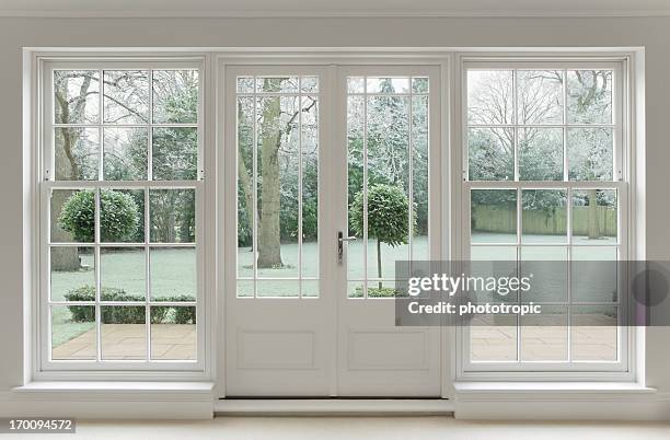 frosty view through white windows - wood ledge stock pictures, royalty-free photos & images