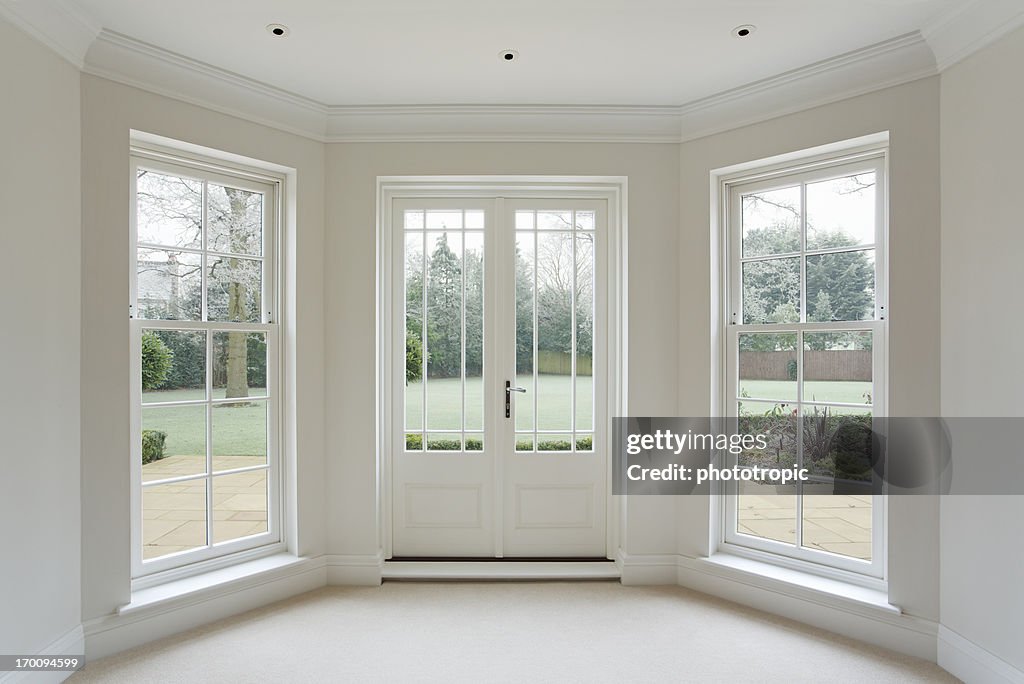 White bay windows and French doors