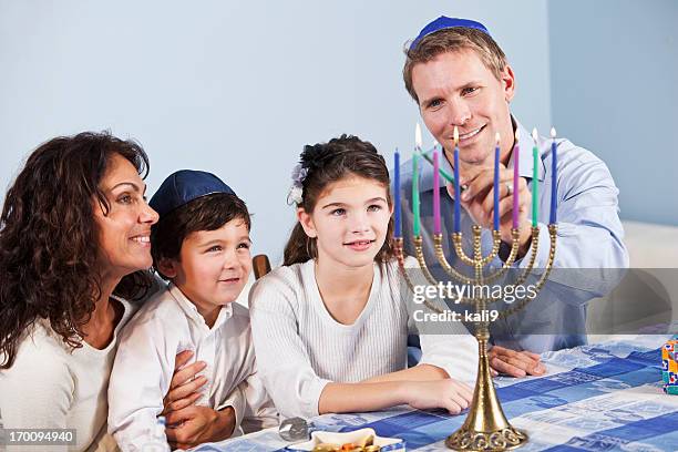 jewish family celebrating hanukkah - jewish people 個照片及圖片檔