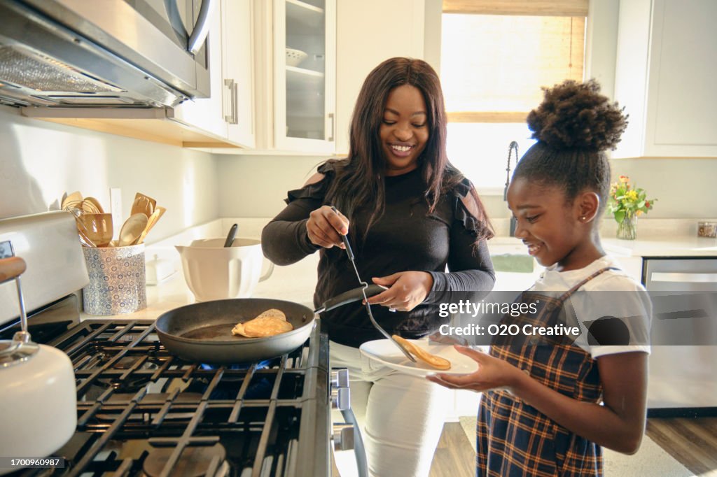 Woman Cooking in a Kitchen