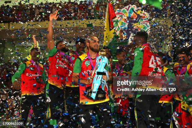 Imran Tahir, captain of Guyana Amazon Warriors lifts the Republic Bank Caribbean Premier League Trophy after winning the Republic Bank Caribbean...