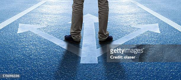 boy/man about to make a decision - footpath stock pictures, royalty-free photos & images