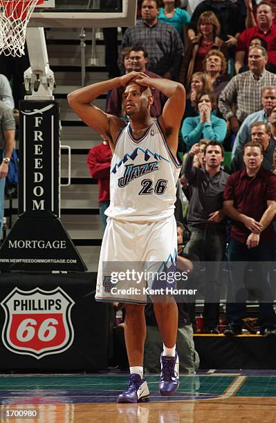 John Amaechi of the Utah Jazz looks on during the NBA game against the Sacramento Kings at Delta Center on December 14, 2002 in Salt Lake City, Utah....