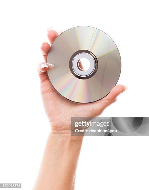 mano de mujer sosteniendo en blanco en blanco de disco - compact disc fotografías e imágenes de stock
