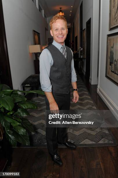 Kristoffer Winters celebrates with Jeremy Renner the launch of Robb Report "Home & Style" on June 6, 2013 in Los Angeles, California.