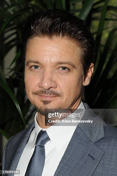 Actor Jeremy Renner celebrates with Kristoffer Winters the launch of Robb Report "Home & Style" on June 6, 2013 in Los Angeles, California.