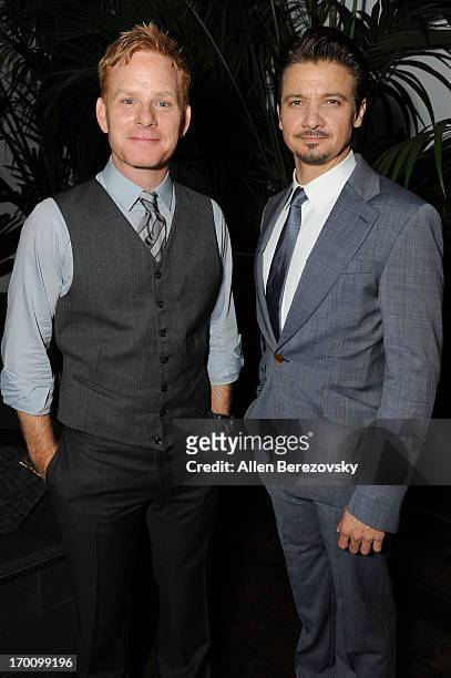 Actor Jeremy Renner and Kristoffer Winters celebrate the launch of Robb Report "Home & Style" on June 6, 2013 in Los Angeles, California.