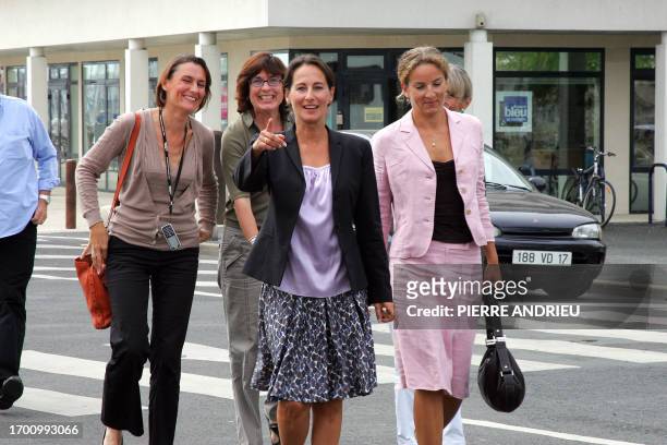 French socialist president of the Poitou-Charentes region Segolene Royal arrives with her press officer Agnes Longueville and her successor deputy...