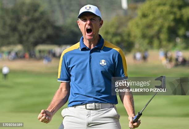 Europe's English golfer, Justin Rose reacts after making his putt on the 15th green during his singles match against US golfer, Patrick Cantlay on...