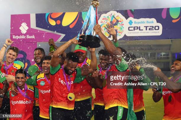 Guyana Amazon Warriors players celebrate winning the 2023 Republic Bank Caribbean Premier League Trophy after the Republic Bank Caribbean Premier...