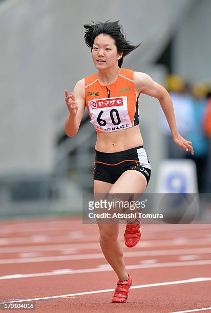 Anna Doi of Japan in action during the Women's 100m sprint during day one of the 97th Japan Track & Field Championships at Ajinomoto Stadium on June...