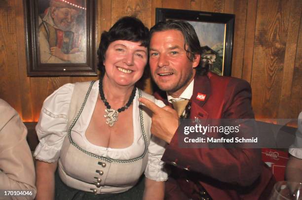 Maria Herzerl-Mitzi Eder and Frenkie Schinkels pose during the beauty competition 'Miss Wiener Wiesn-Fest 2013' at Bettel-Alm on June 6, 2013 in...