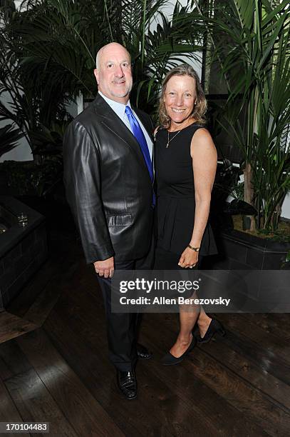 Bill Curtis and wife Lisa Curtis attend Jeremy Renner's and Kristoffer Winters' celebration of the launch of Robb Report "Home & Style" on June 6,...