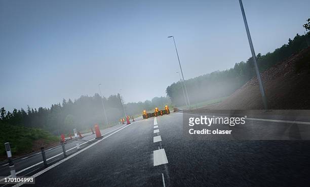 roadwork on the road - red beacon stock pictures, royalty-free photos & images