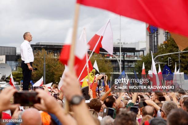 Polish opposition leader, former premier and head of the centrist Civic Coalition bloc, Donald Tusk addresses participants of a rally in Warsaw on...