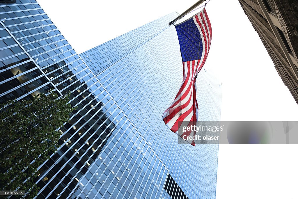 Glass and steel building, american flag