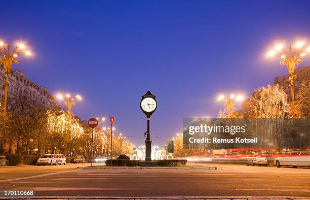 bucharest - time lapse clock stock pictures, royalty-free photos & images