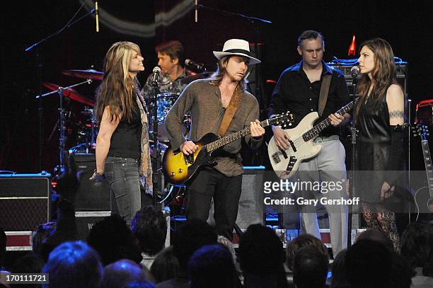Paula Nelson, Lukas Nelson and Amy Nelson perform on stage at the Hard Rock International's Wille Nelson Artist Spotlight Benefit Concer at Hard Rock...