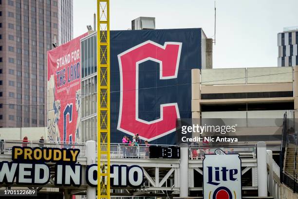The Cleveland Guardians C logo is pictured during the game between the Cleveland Guardians and Baltimore Orioles at Progressive Field on September...