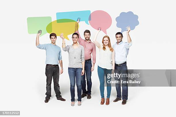 group of people holding individual speech bubbles. - holding prop stock pictures, royalty-free photos & images