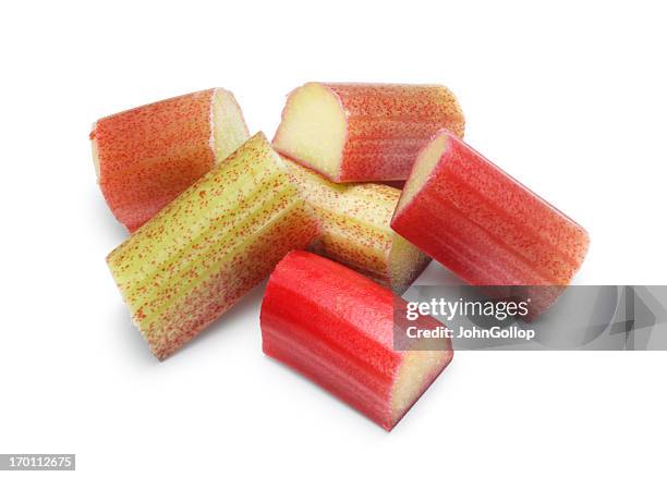 large chunks of rhubarb over white background - rhubarbe stock pictures, royalty-free photos & images