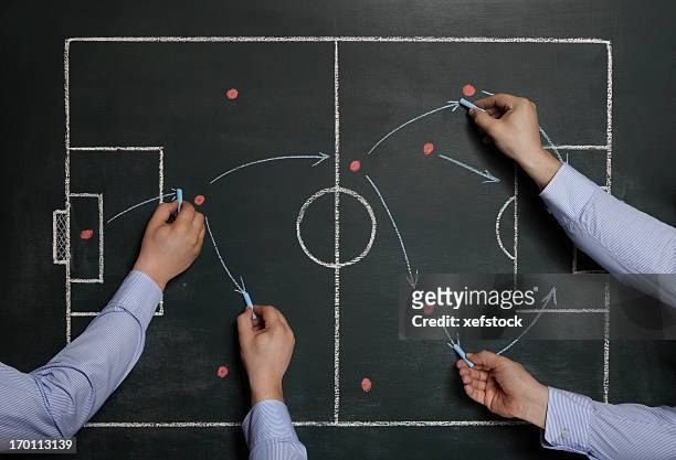 teamwork strategy - football game plan stock pictures, royalty-free photos & images