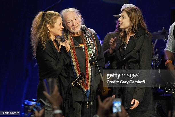 Annie D'Angelo, Willie Nelson and Amy Nelson perform on stage at the Hard Rock International's Wille Nelson Artist Spotlight Benefit Concer at Hard...