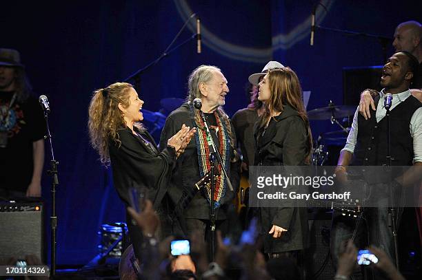 Annie D'Angelo, Willie Nelson and Amy Nelson perform on stage at the Hard Rock International's Wille Nelson Artist Spotlight Benefit Concer at Hard...