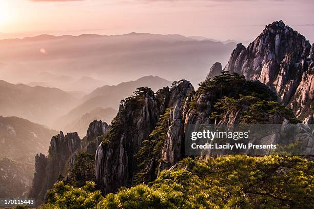 sunrise in the top of mt.huangshan - huangshan mountains stock pictures, royalty-free photos & images