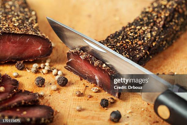 dried meat - beef jerky stock pictures, royalty-free photos & images